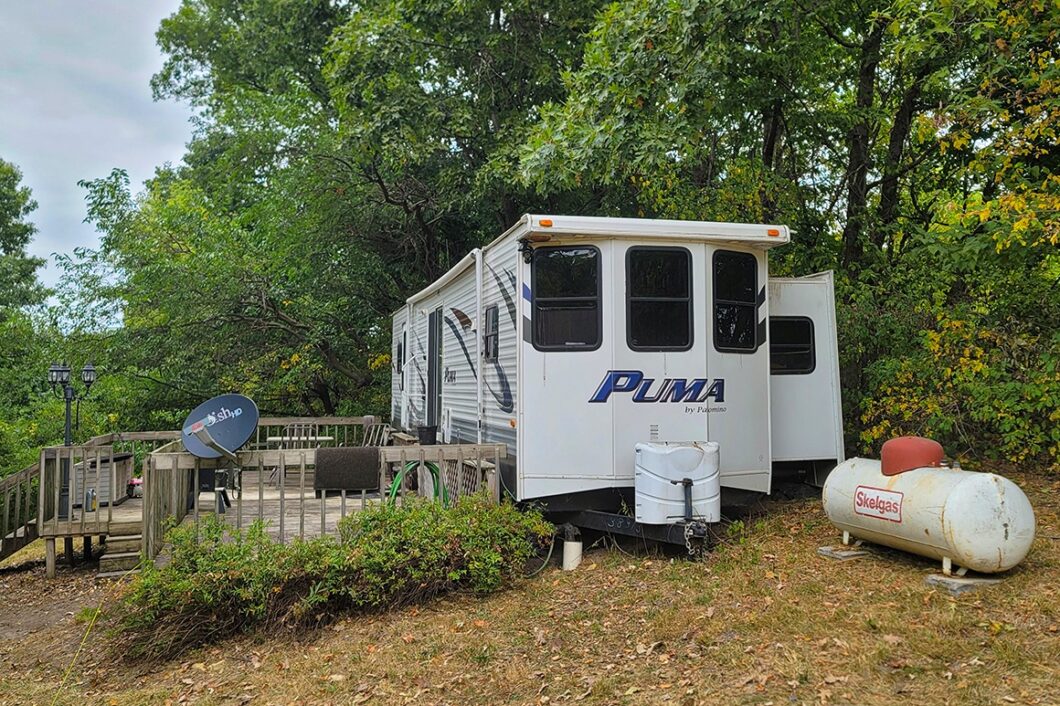 8 Acres Wooded Land with 28’ Camper near De Soto, WI!