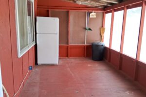 4.2-acre wooded property with 2-bedroom cabin near Fishtrap Lake in Sawyer County, WI, offering privacy, lake access, and Northwoods recreation