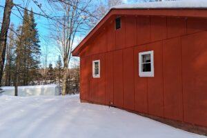 4.2-acre wooded property with 2-bedroom cabin near Fishtrap Lake in Sawyer County, WI, offering privacy, lake access, and Northwoods recreation