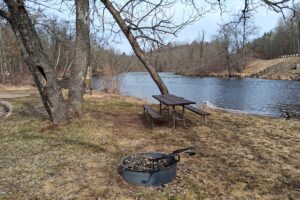 Wooded buildable land near the Namekagon River in Trego, Wisconsin with cleared driveway and private forest setting