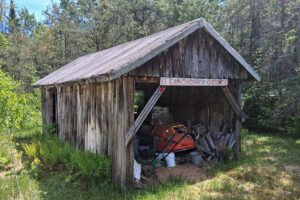 Somo River waterfront property near Tomahawk & Tripoli, WI. Includes cabin, well, septic, and electric. Nearly 400 ft frontage